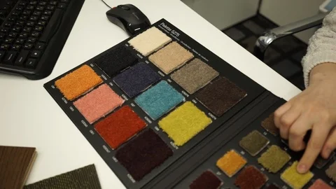 A hand touches samples of materials Stock Footage 98071641