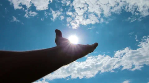 The hand touches the sun Stock-Footage 25748096