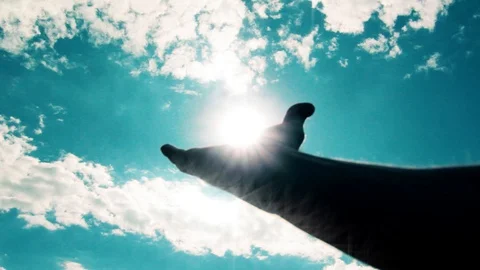 The hand touches the sun Stock Footage 112866593