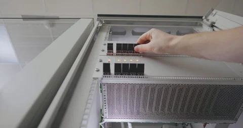Hand touches switches of server close up Stock Footage 107339128
