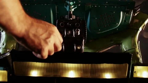 Hand touches the upper control panel of the aircraft. Latitude altitude Stock Footage 208630424