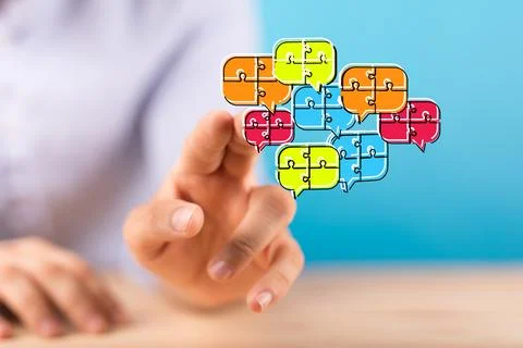 Hand touching the 3D rendered digital icons with colorful dialog speech bubbl Fotos de archivo