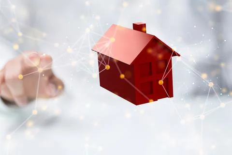 Hand touching a 3D rendered red house for digital cyberscase and home security c Foto stock