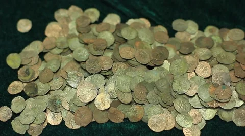 Hand touching ancient medieval coins Stock Footage 59154278