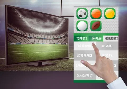 Hand touching a Betting App Interface television Stock Photos