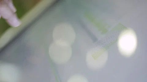 Hand touching big screen and scrolling down and up Stock Footage 112950816