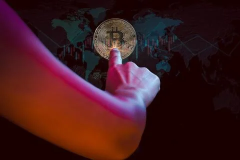 Hand touching bitcoin virtual globe modren business technology concept. Stock Photos