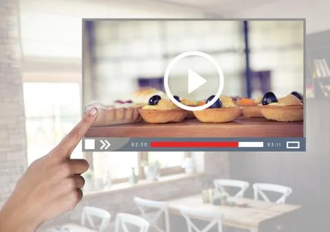 Hand touching Cafe Baking cakes video player App Interface Stock Photos