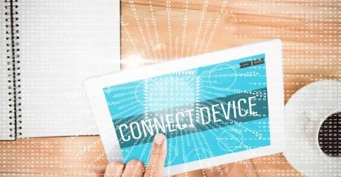 Hand touching connect device text on screen of digital tablet 写真素材