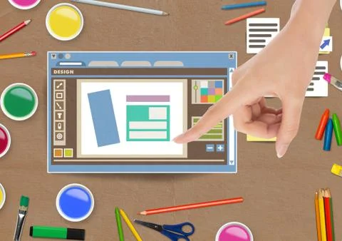 Hand touching Design editor window and creative art objects on Paper cut out 스톡 사진