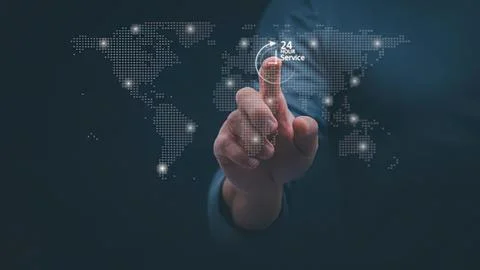 Hand touching digital world map with 24 hour service icon Stock Photos