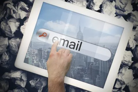 Hand touching email on search bar on tablet screen Illustrazione stock