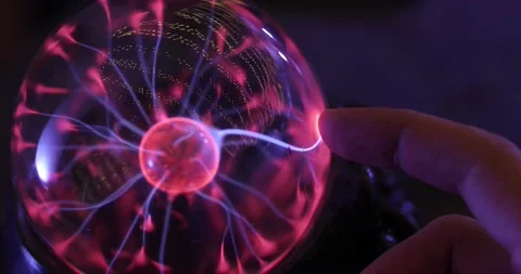 Hand touching with finger electric plasma ball Stock-Footage 147320197