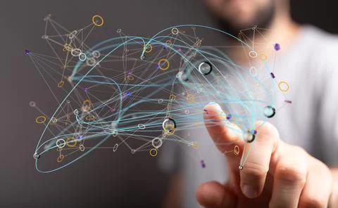 Hand touching the floating dots with connecting strings. Stockfoto's