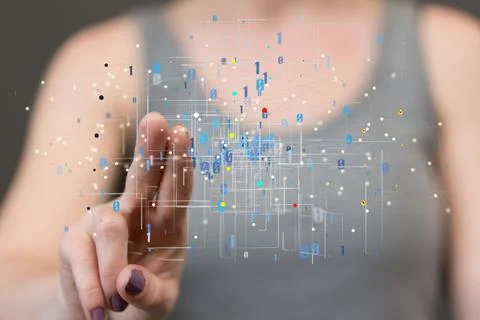 Hand touching a hologram of a grid with binary numbers. Foto stock
