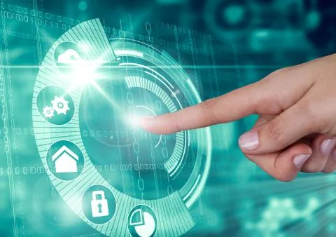 Hand touching interface in technology illuminated background Stock Photos