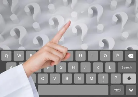 Hand Touching Keyboard with question marks App Stock Photos
