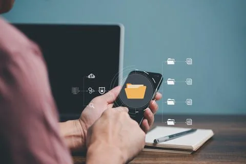 Hand touching on Mobile phone screen with cyber network, Folder, Document,Sto Stock Photos