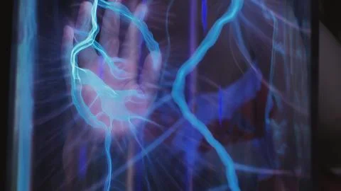 Hand touching plasma globe generating electric light arcs and static electricity Stock Photos