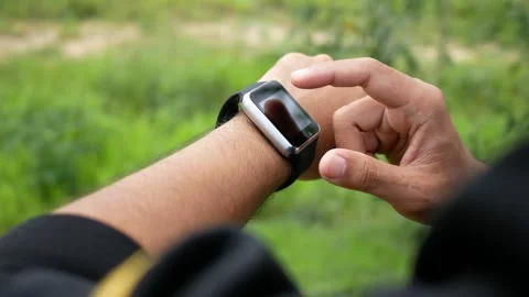 Hand touching on screen of smart watch Stock Footage 160556237