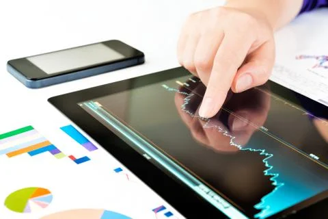 Hand touching screen of tablet pc Foto stock