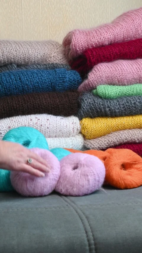 Hand touching soft wool yarn. Stock Footage 334749405