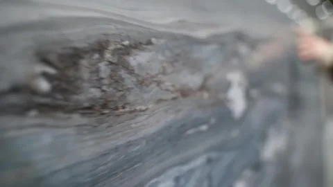 Hand Touching Textured Marble Stone Wall Stock Footage 306520430
