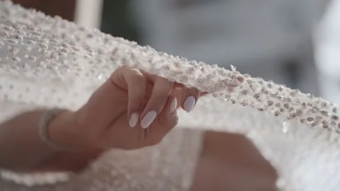 Hand touching the veil close-up Vídeo Stock 228412658