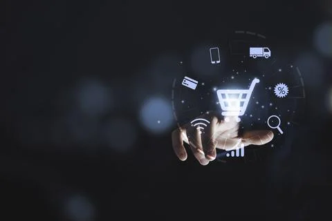 Hand touching to virtual info graphics with trolley cart icons , Technology.. Stock Photos