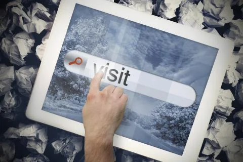 Hand touching visit on search bar on tablet screen Illustrazione stock