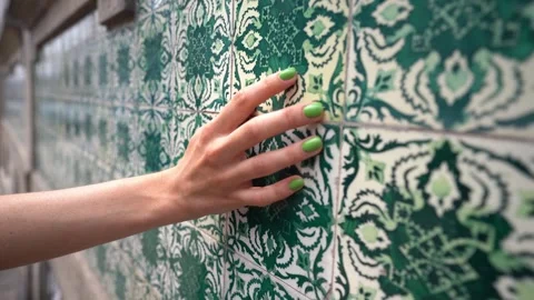 Hand touching wall with green azulejo tiles, close view Stock Footage 255290967