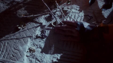Hand Touching Weeds on Satanic ground Vídeo Stock 259792550