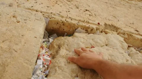 Hand touching the Western Wall of Jerusalem Stock Footage 20513162