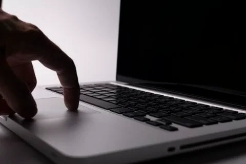 Hand on trackpad Stock Photos