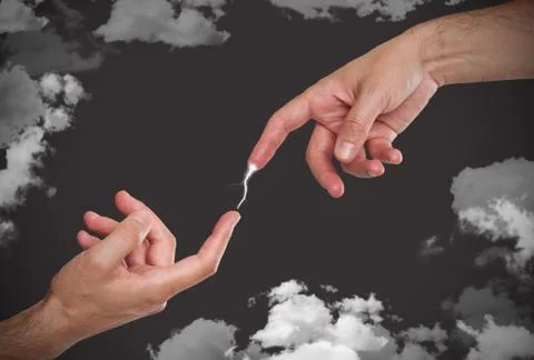 Hand transferring lightning bolt to another hand Stock Photos
