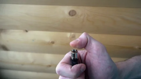 Hand tries to light the lighter slow motion Stock Footage 74753397