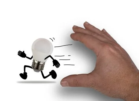 Hand trying to catch a light bulb. concept of catching an idea Stock Photos