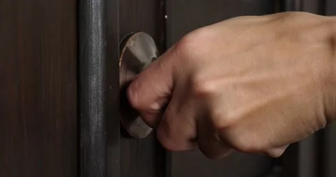 Hand trying to open a locked door closeup Stock Footage 218290032