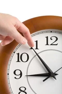 Hand trying to stop time isolated Foto stock