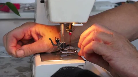 Hand Is Trying To Thread The Needle Of A Sewing Machine Stock Footage 113732169