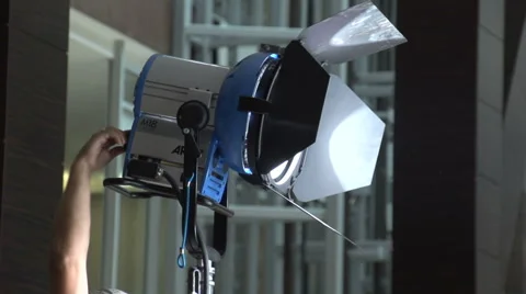 Hand tuning lighting fixture Stock Footage 61933539