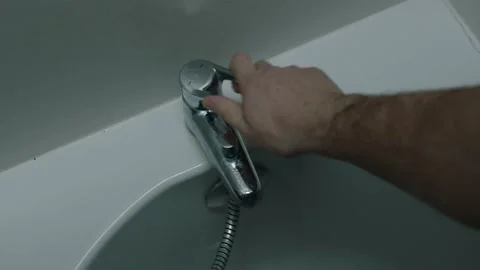 Hand Turn On Faucet Shower Video stock 196209568