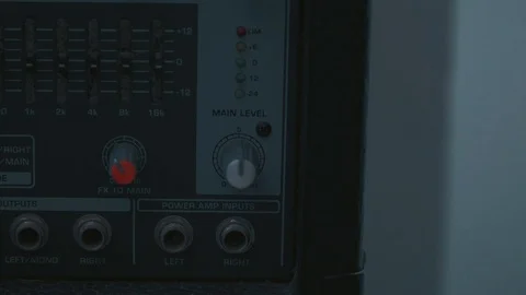 Hand turn off main level knob and fx level knob on analog mixer Stock Footage 87910845