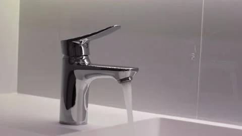 Hand of turn open or off the faucet Stock Footage 158276105