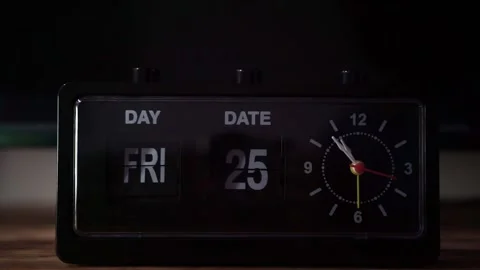 Hand turning alarm clock button close up, dim lighting, morning routine and Stock Footage 343421767