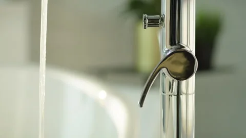 Hand turning on Bath Tap Stock Footage 260356926