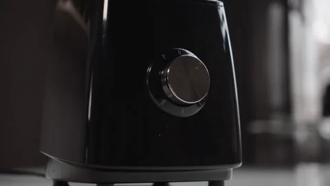 Hand Turning Blender Control Knob to Start Kitchen Appliance Stockbeeldmateriaal 331786887