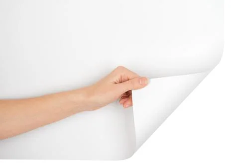 Hand turning bottom empty page corner Stock Photos
