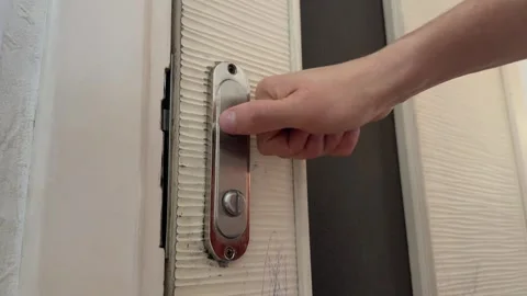 Hand turning door handle and opening interior door. Everyday home action, Video stock 336978647