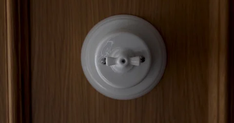Hand Turning On The Electric Switch Stock Footage 118200222